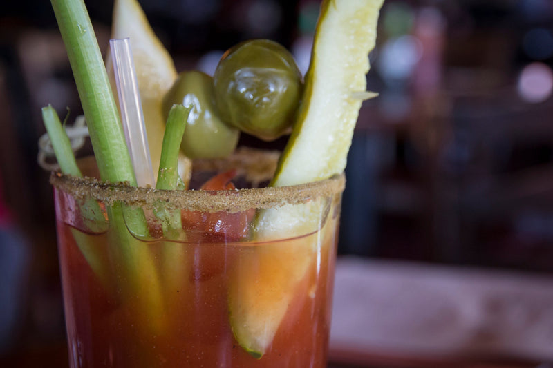 Bloody Mary with Pickle Spear, Celery, Lemon Wedge,and Olives