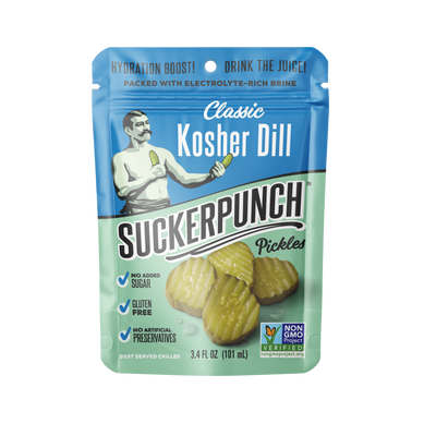 A 3 fl oz stand-up pouch of Suckerpunch Classic Kosher Dill Pickles on a plain white background. The packaging features a blue top section and a light green bottom section with product imagery of gherkin pickles and a vintage-style illustration of a man holding a pickle.